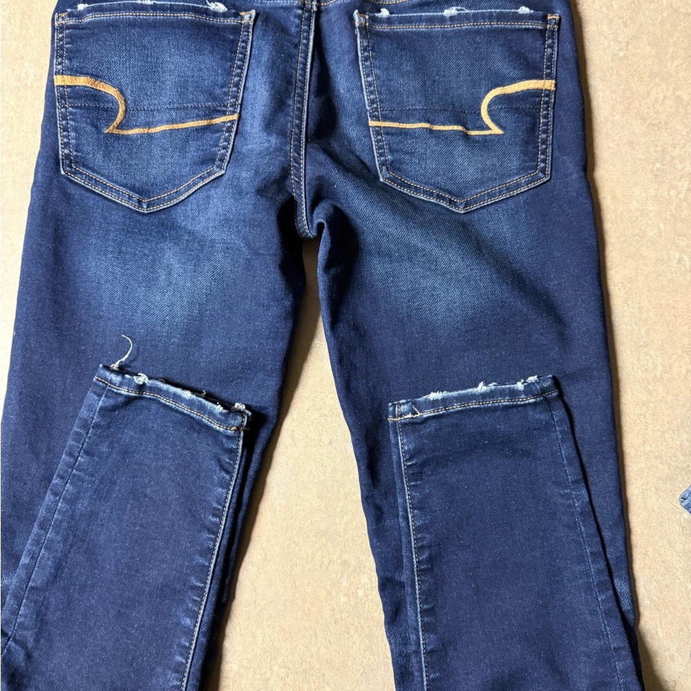 American Eagle Outfitters Navy Distressed Jeggings “Super Stretch”